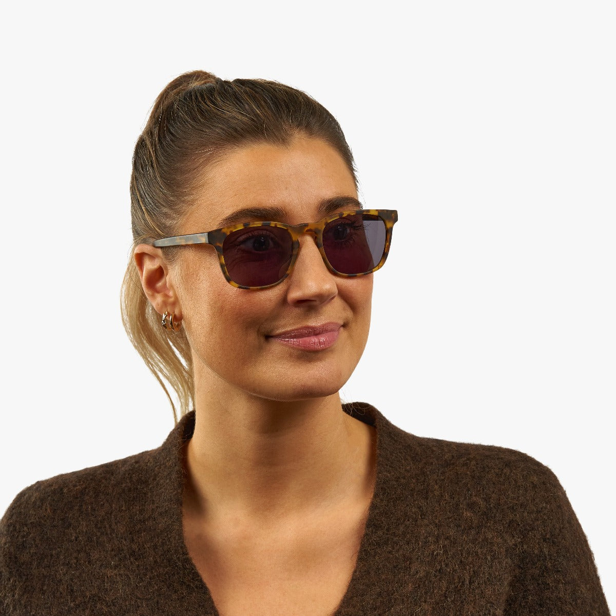 Person wearing Bornholm Light Turtle sunglasses with tortoiseshell frame