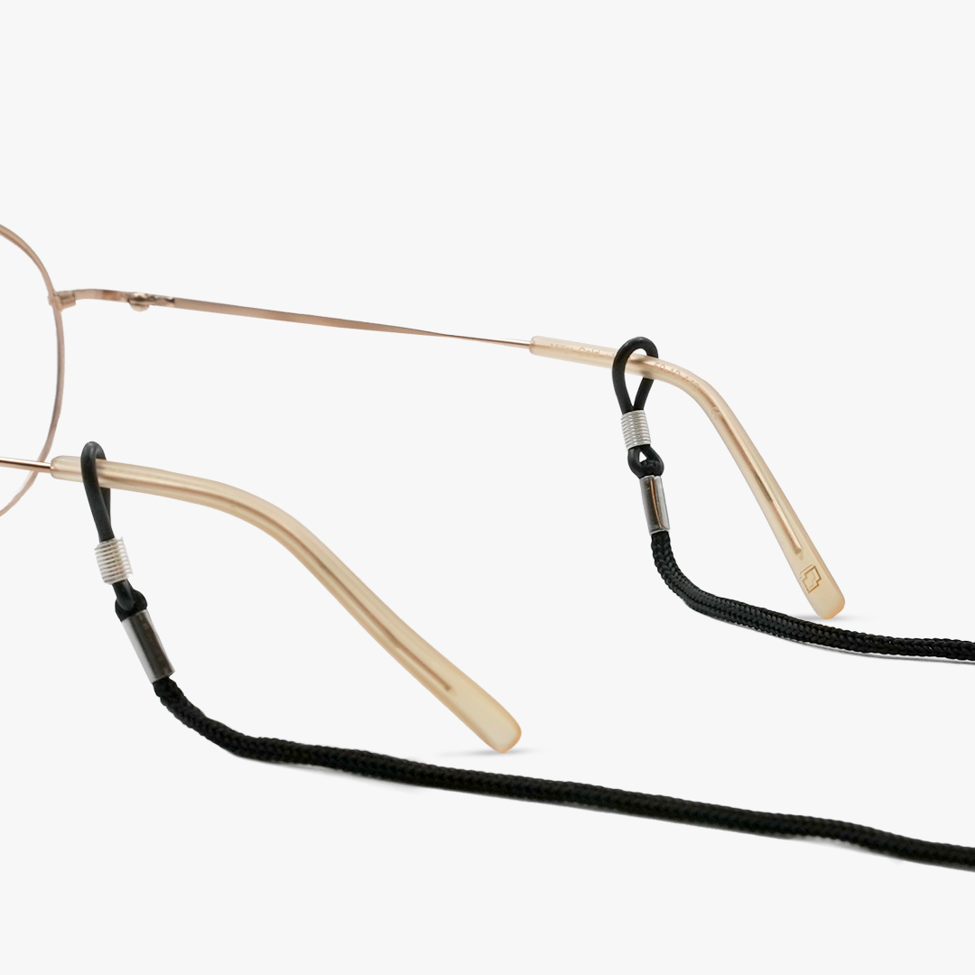 Gold temples of glasses with a black nylon cord attached