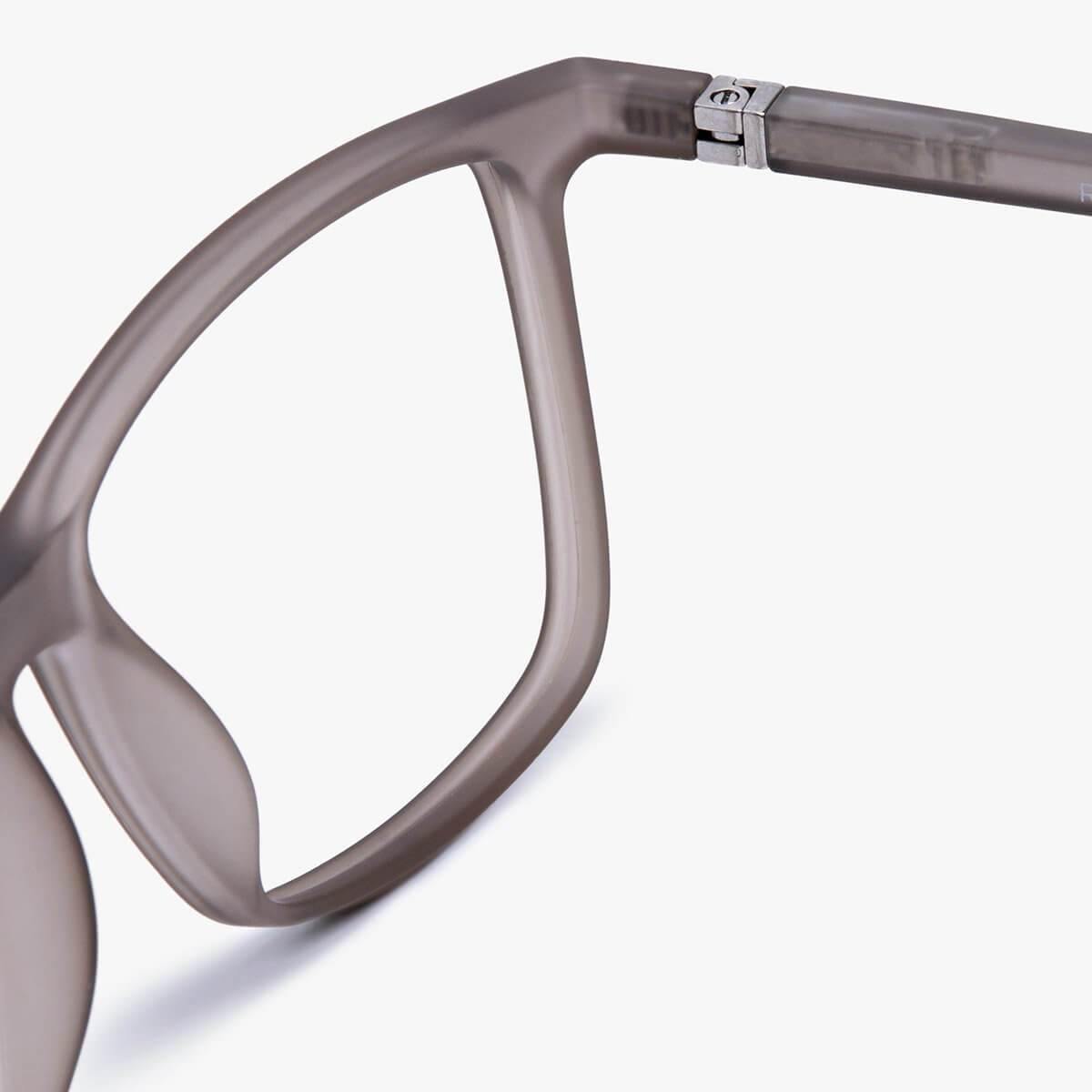 Close-up of København Grey glasses with matte finish and sleek design