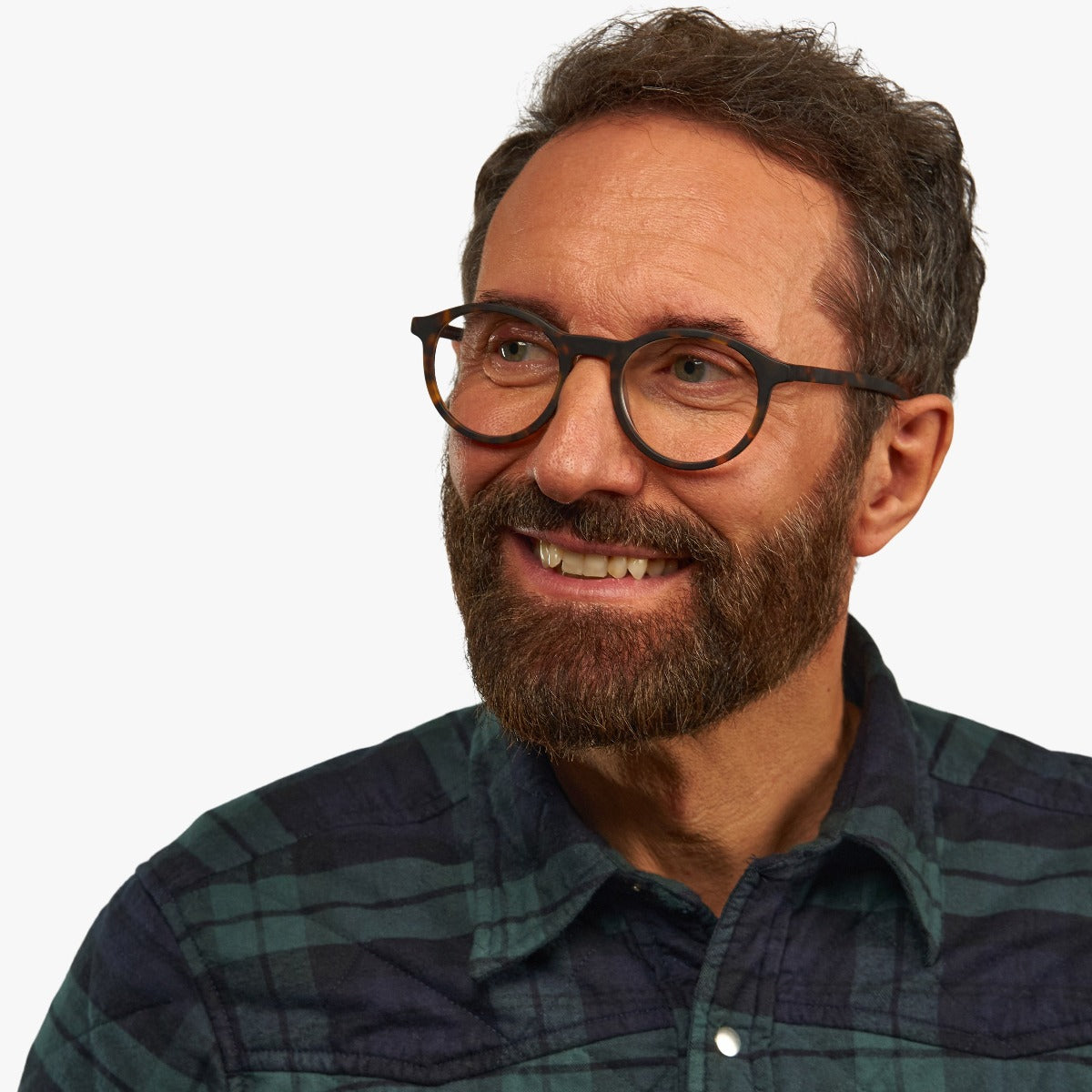 Person wearing Løkken Dark Turtle glasses