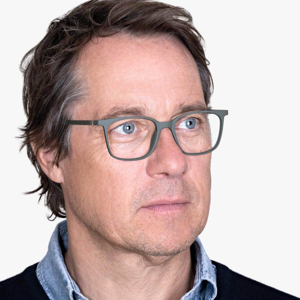 Person wearing Men's Fyn Dark Army eyeglasses