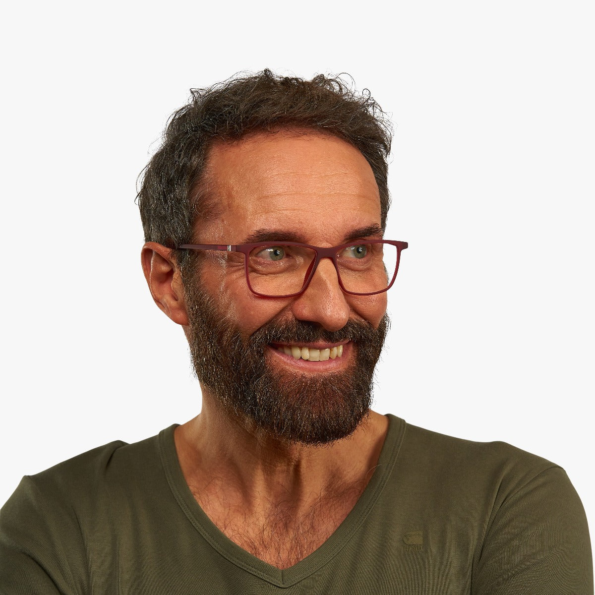 Person wearing red square glasses