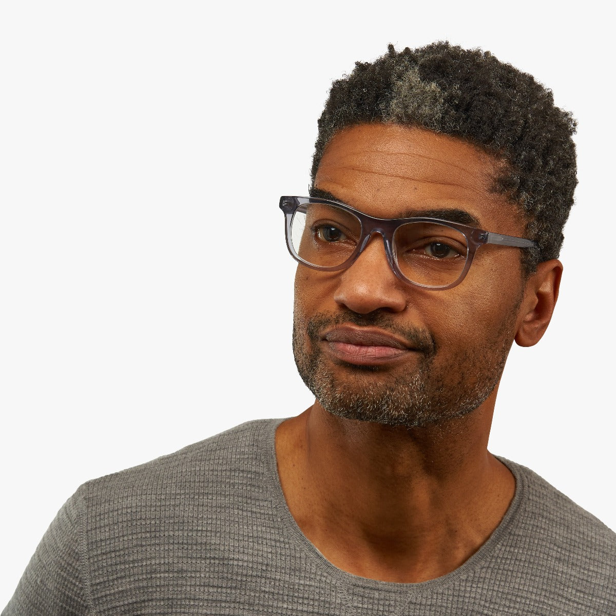 Person wearing crystal grey reading glasses