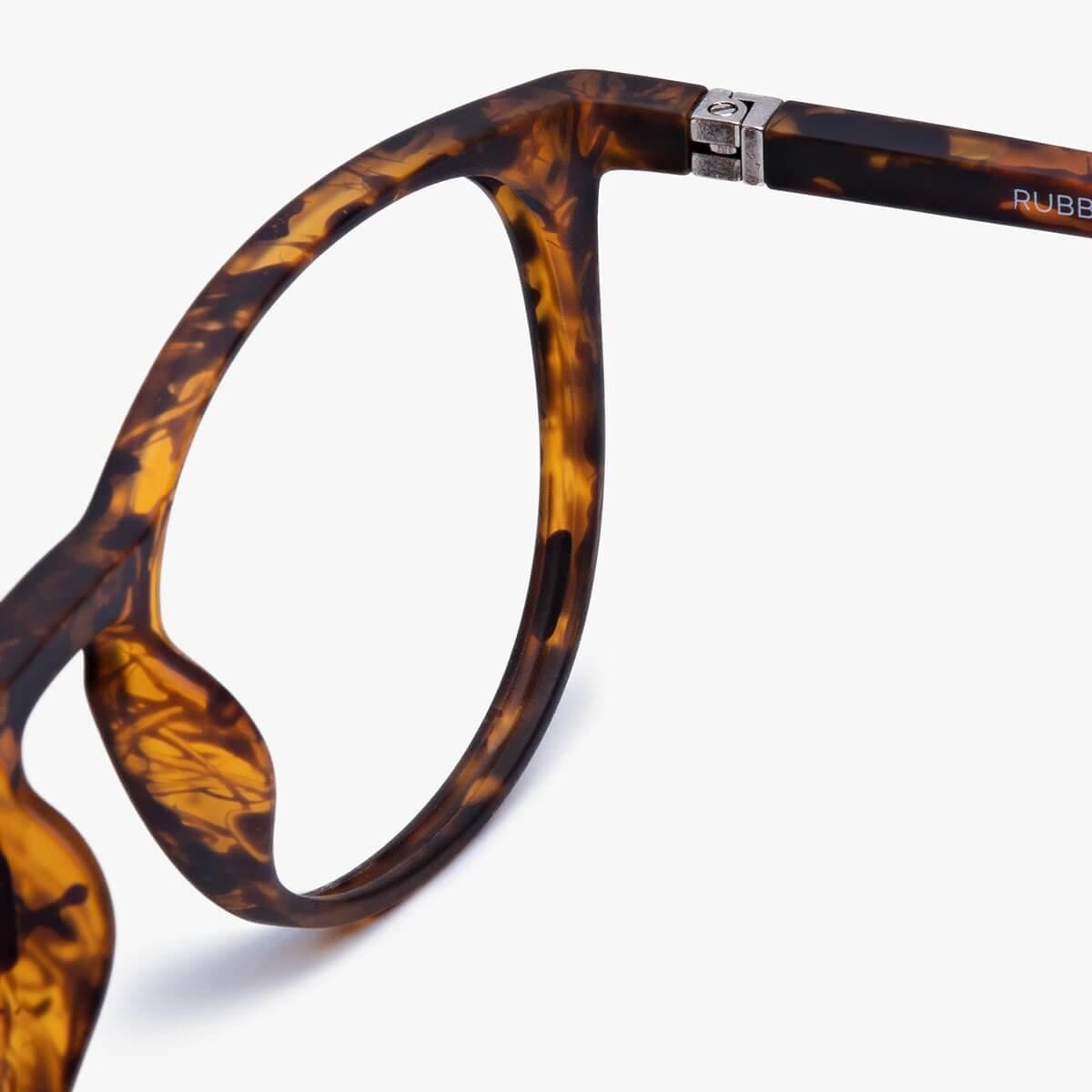 Brown tortoiseshell eyewear frame with silver hinge detail