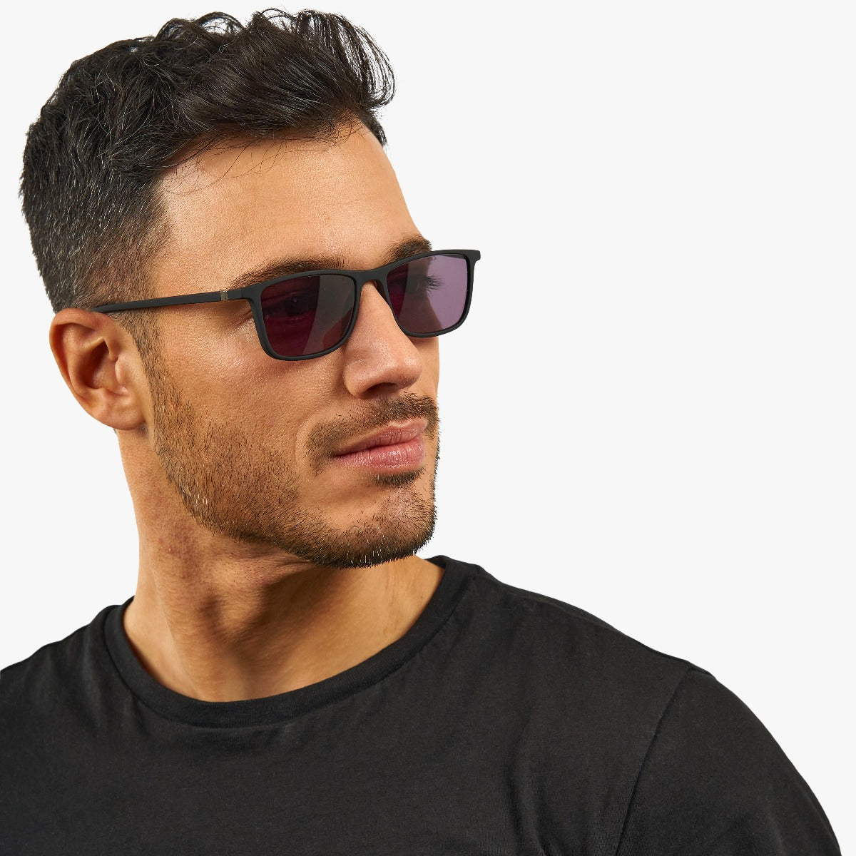 Person wearing Skagen Black sunglasses with dark lenses