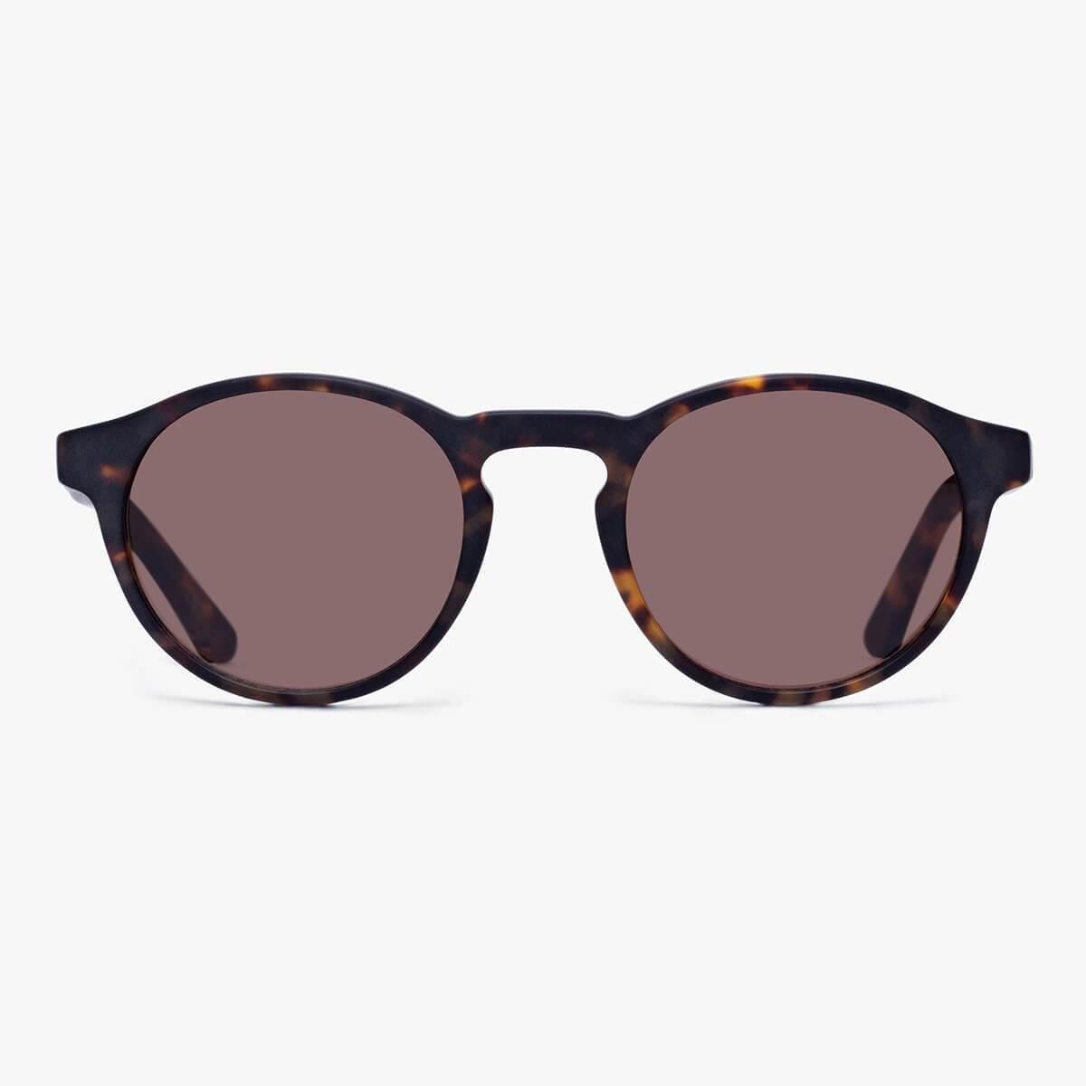 Trondheim Dark Turtle tortoiseshell round sunglasses with dark lenses
