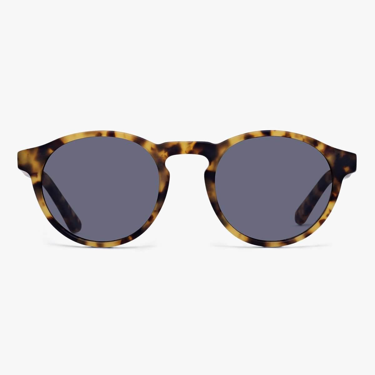 Trondheim Light Turtle sunglasses with tortoiseshell frame and dark lenses