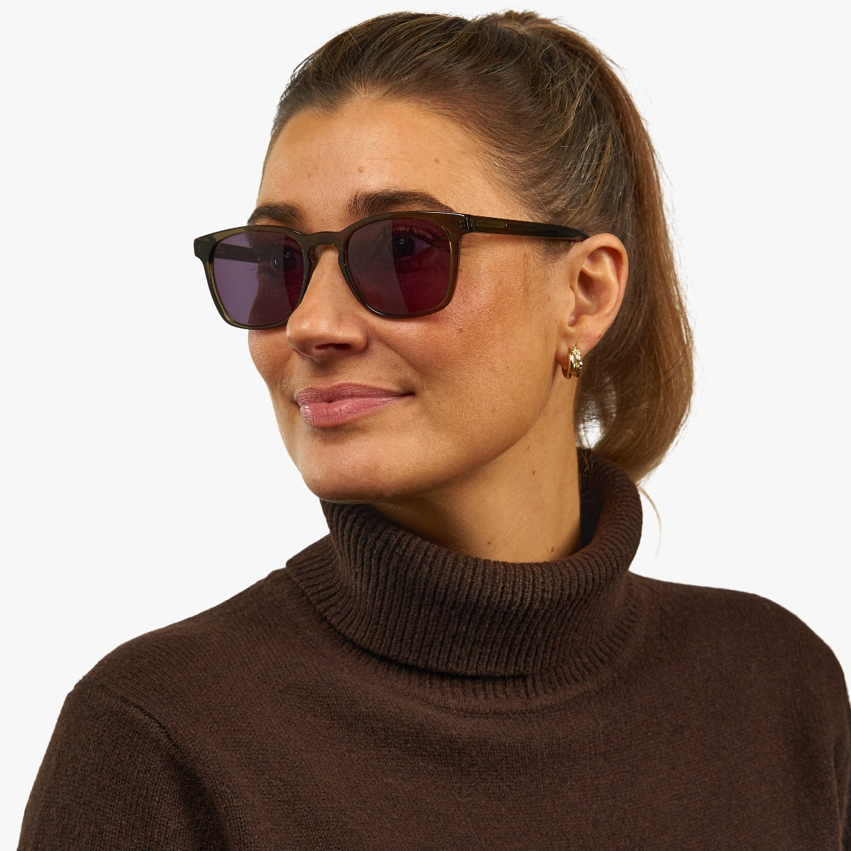 womens-bornholm-shiny-olive_sunglasses_female-model-1.jpg?v=1771420615&width=1200