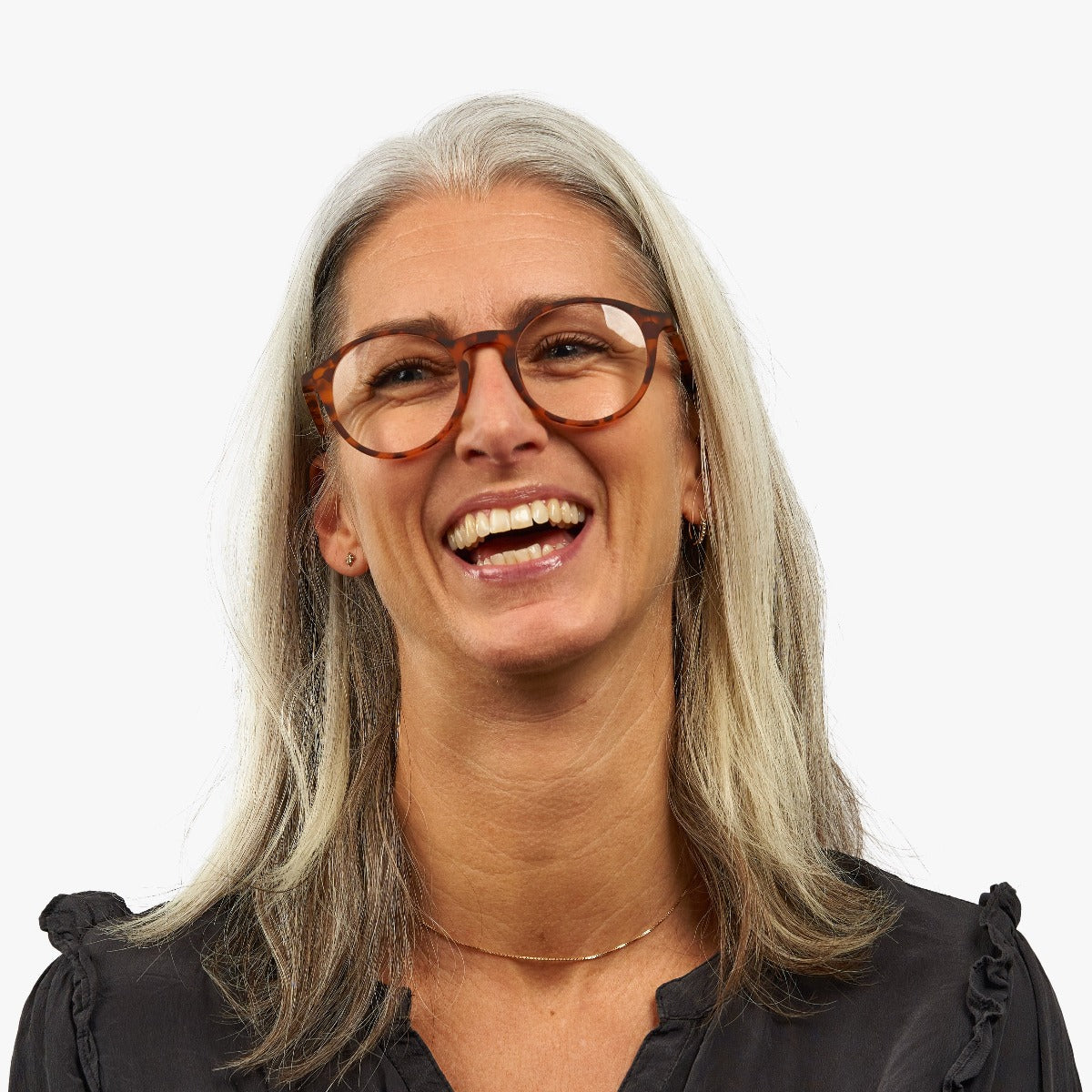 Person wearing Women's Læsø Turtle tortoiseshell round glasses